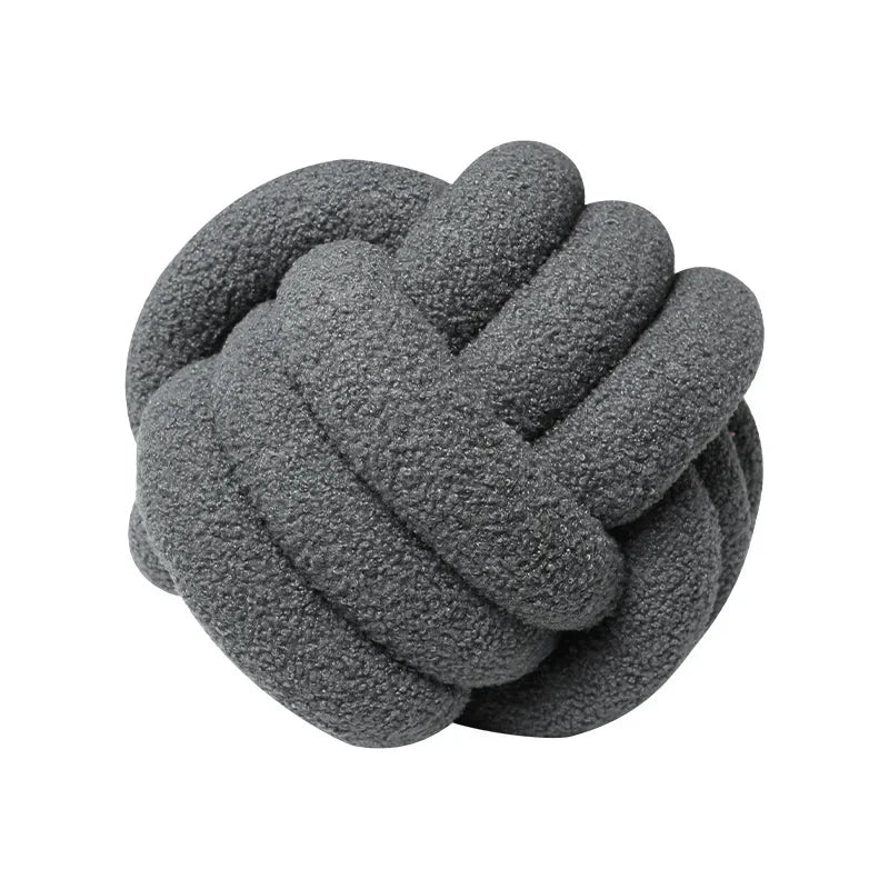 Knotted ball-shaped cushion