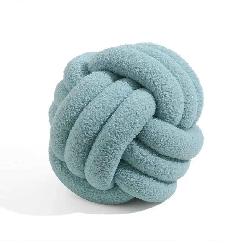 Knotted ball-shaped cushion