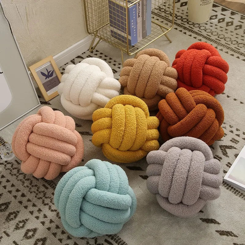 Knotted ball-shaped cushion