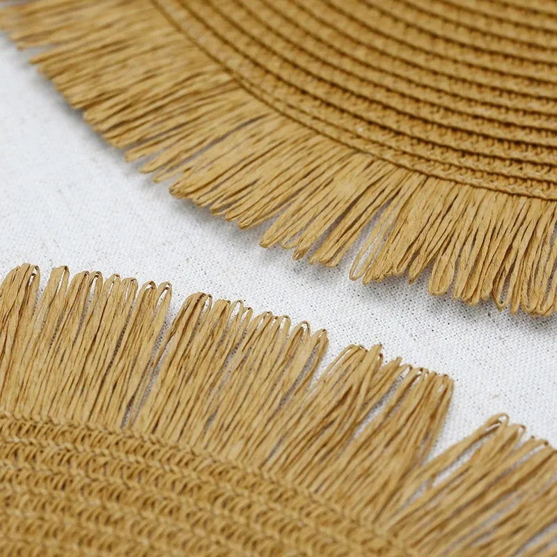 Hand-woven round placemat with fringes