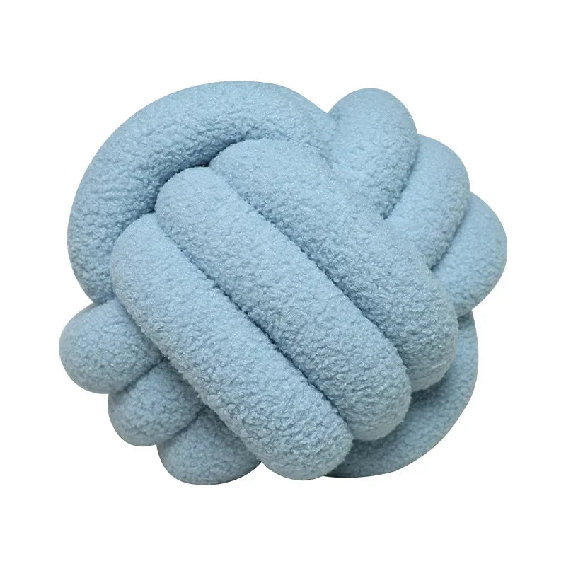 Knotted ball-shaped cushion